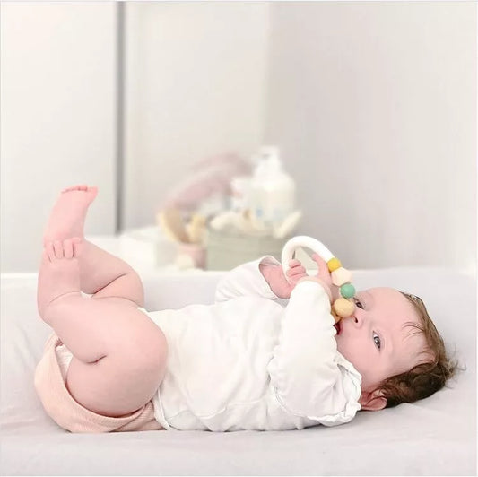 Pitigaïa Bijtring Roze - Siliconen en Beukenhout